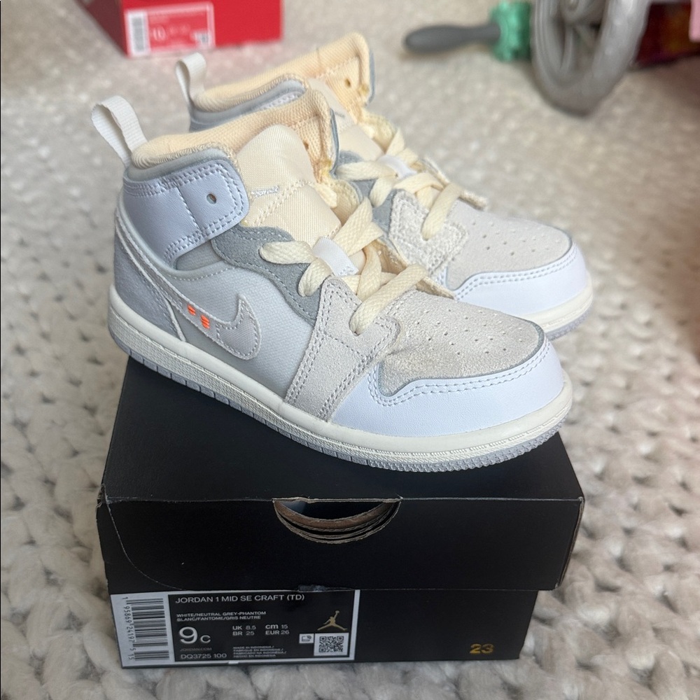 Jordan Kids Mid Top Sneakers in White and Light Gray,Subtle Yellow-Orange Accent